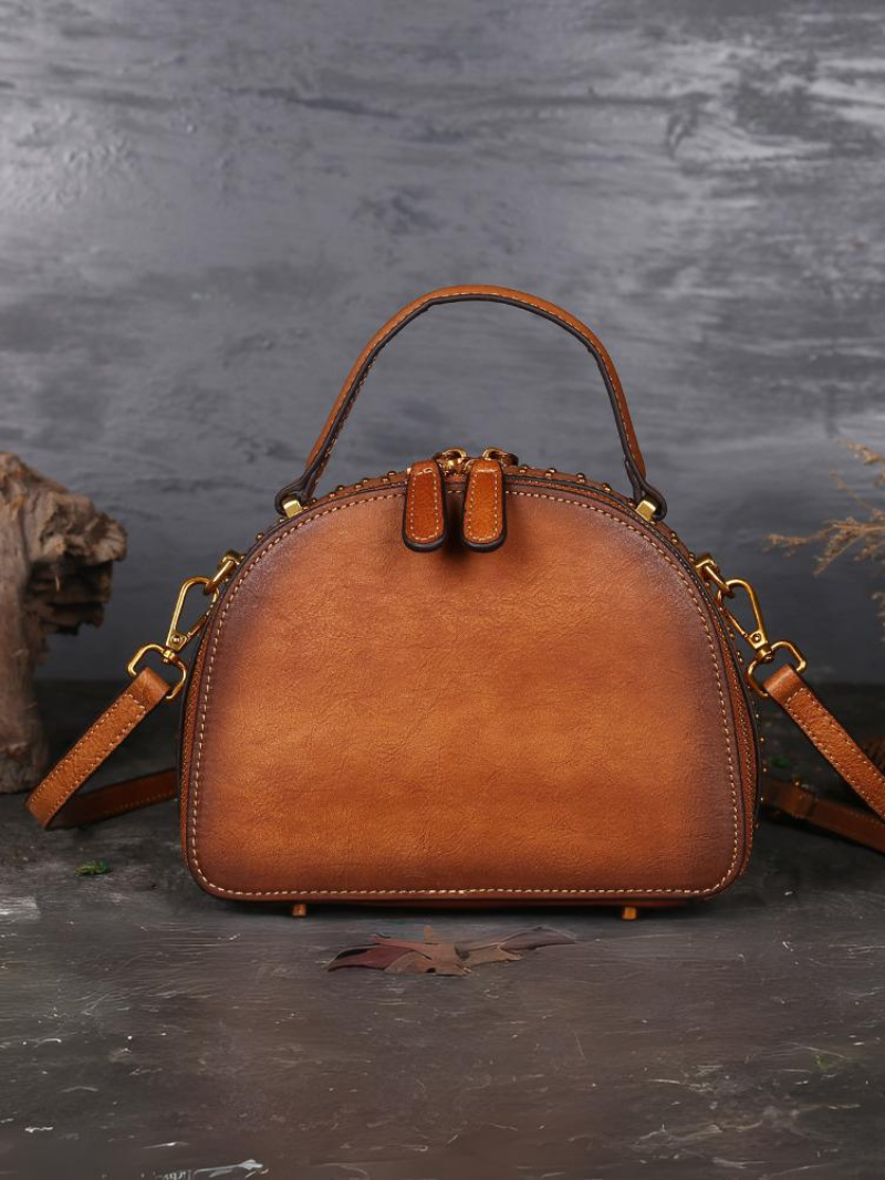 Elegant Ethnic Leather Round Bag | Eva Trends