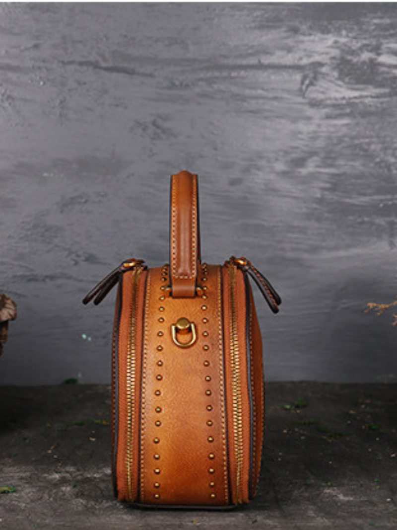 Elegant Ethnic Leather Round Bag | Eva Trends
