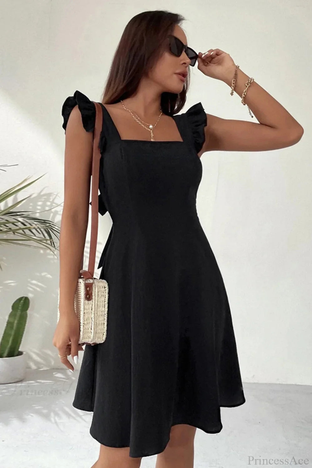 Sleeveless Mini Dress with Ruffle Tie-back