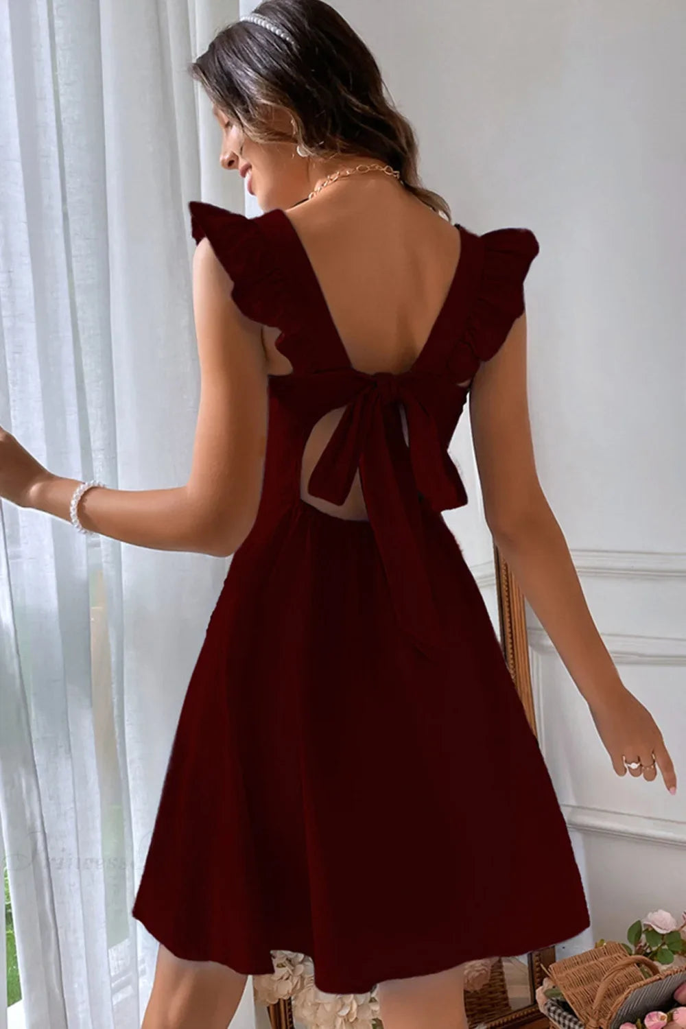 Sleeveless Mini Dress with Ruffle Tie-back